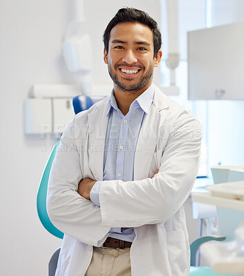 Buy stock photo Dentist, portrait and man with arms crossed for healthcare service, dental hospital or insurance in consultation office. Happy asian person or doctor with teeth, oral or hygiene health in clinic