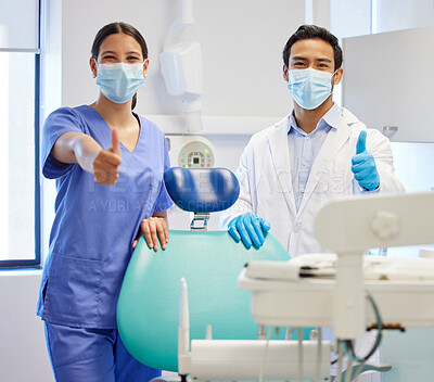 Buy stock photo Dentist team, face mask and thumbs up portrait for
medical industry and teamwork. Assistant woman and asian man or healthcare staff together for dental care, oral health and wellness at practice