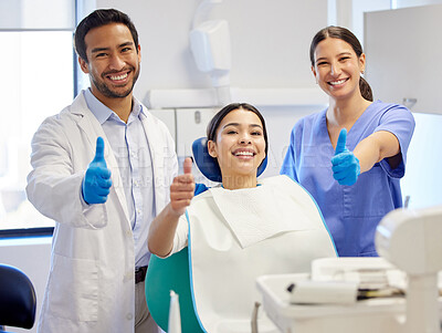 Buy stock photo Dentist team, patient and thumbs up portrait for
consultation, clean or teeth whitening. Woman, asian man or healthcare staff and client together for dental care, oral health exam and mouth cleaning
