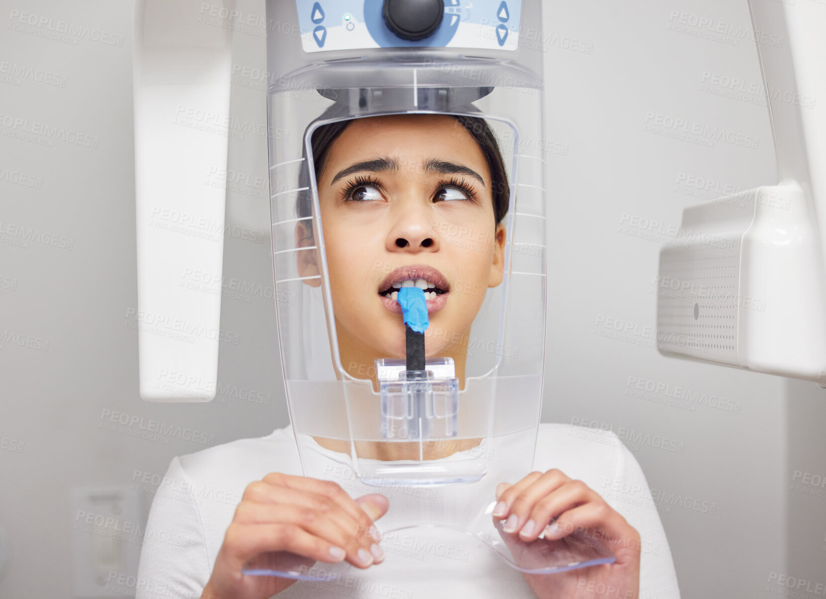 Buy stock photo Woman, mouth or x ray machine at dentist appointment with scared anxiety for cavity, nervous for exam with oral care. Female person, stress or dental process with tools for health insurance in office