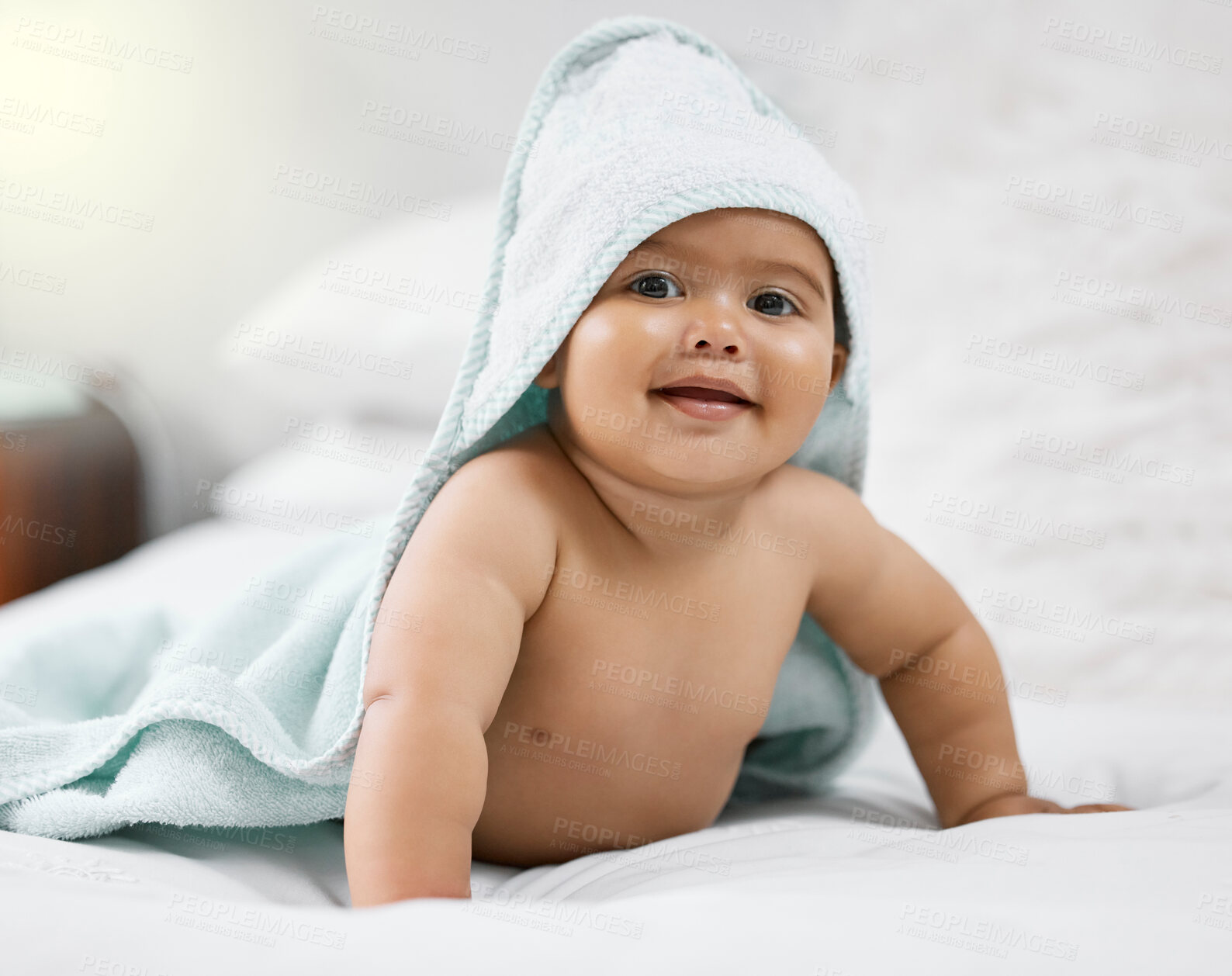 Buy stock photo Child development, bath towel and portrait with baby on bed in home for growth, having fun or playing. Adorable, cute and innocent with happy infant learning to crawl in bedroom of apartment