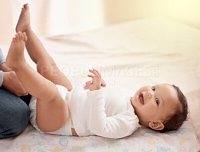 Buy stock photo Happy baby, girl and mother in nursery for diaper change, care and playing in home for development. Cheerful, child and woman for bonding, motor skills and nurture with health, hygiene and comfort