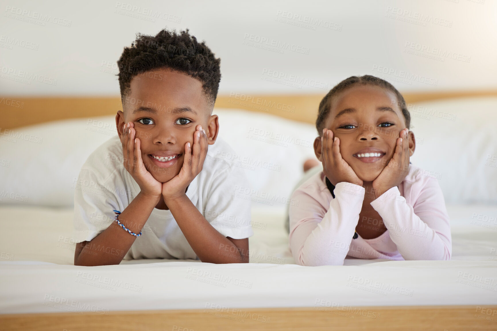 Buy stock photo Relax, smile and portrait of black kids in bedroom for bonding, child development and comfort in morning. Siblings, boy and girl with happiness at home for weekend break, family love and enjoyment