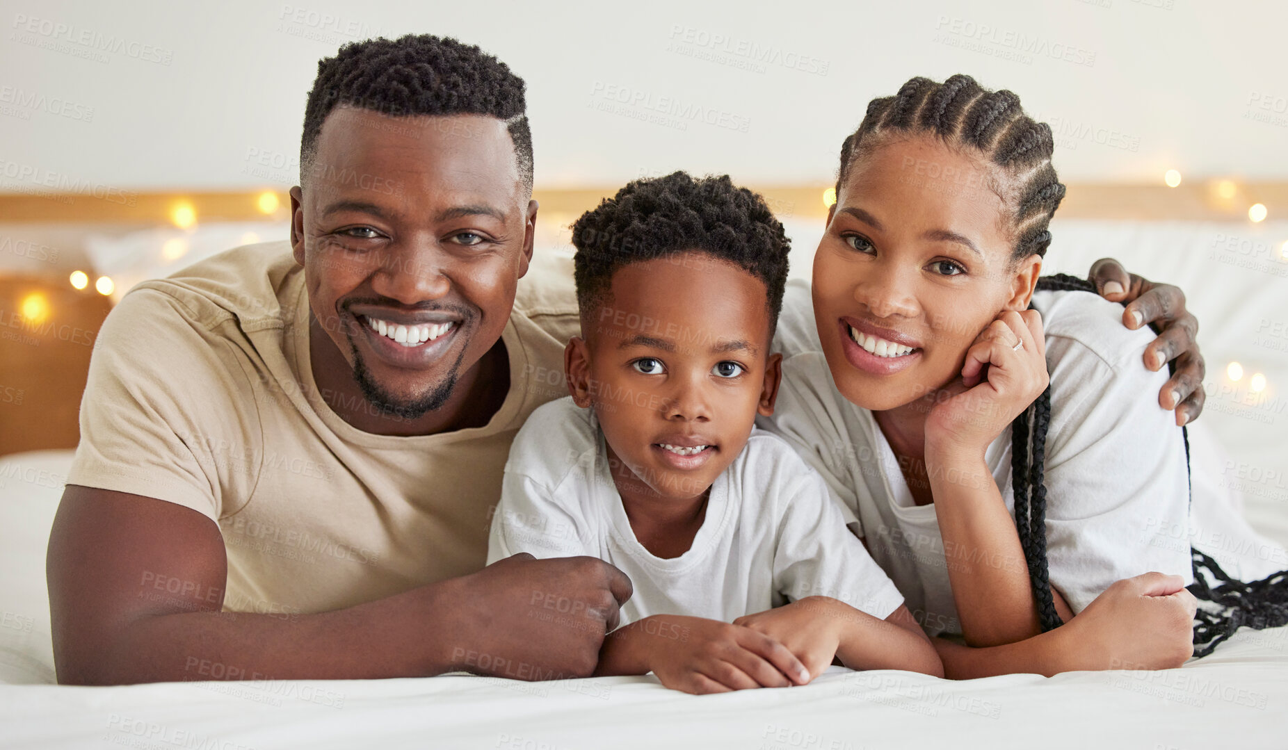 Buy stock photo Black family, portrait and happy kid with parents in bedroom to relax in home. Face, mother and father with boy child in bed for support, connection and bonding together for healthy relationship