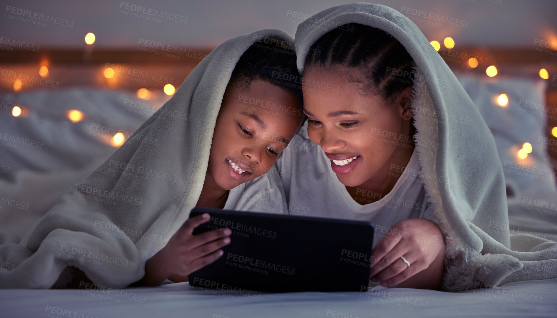 Buy stock photo Mom, son and house with tablet at night for streaming, together with led light for web game. Black parent, boy child and ebook with internet in bedroom for video, online app for learning with digital