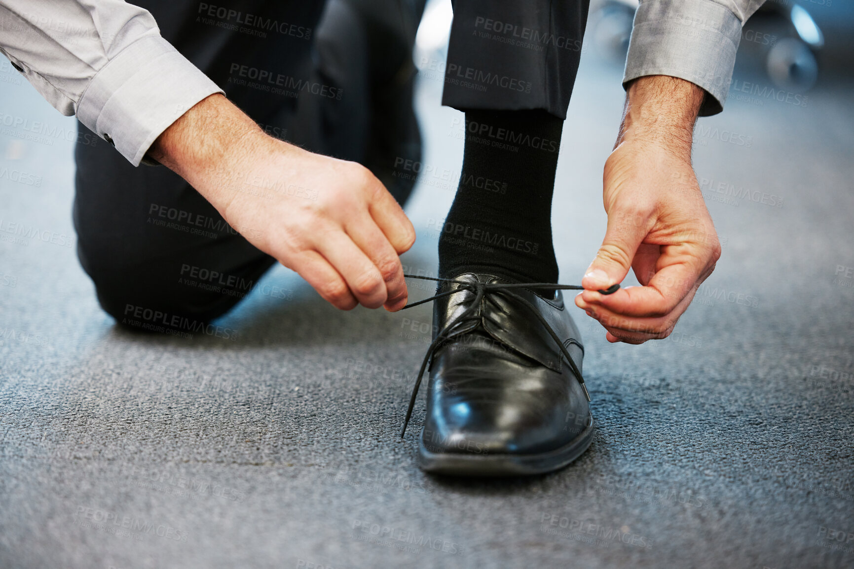 Buy stock photo Businessman, hands and tie shoe in office for preparation, dressing or ready for day. Corporate employee, foot or secure laces in workplace with designer footwear, fashion or professional formal wear