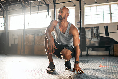 Buy stock photo Man, athlete and fitness with thinking in gym for exercise break, resting and relax with workout challenge. Bodybuilder, person and thoughtful at sports center for bodybuilding, training and wellness