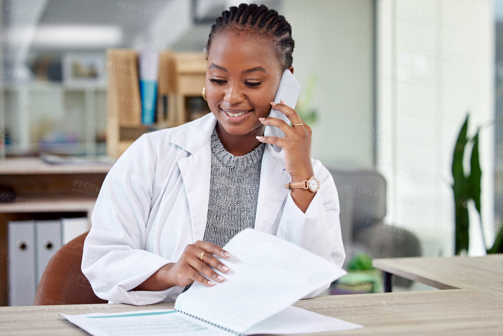 Buy stock photo Phone call, doctor or black woman in office with paperwork, smile and files for hospital schedule. Healthcare, planning and medical professional with cellphone, advice and health insurance documents