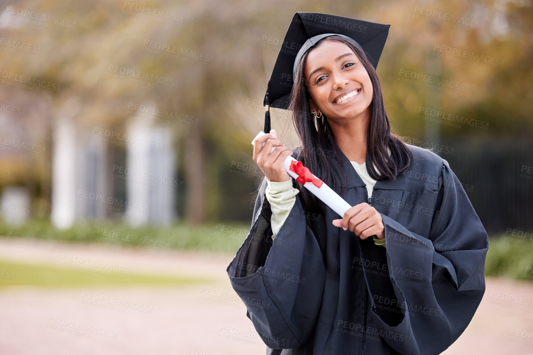 Buy stock photo Success, portrait of college student and with certificate on her graduation day outside of campus. Education or achievement, graduate or smile and female person with diploma at university outdoors