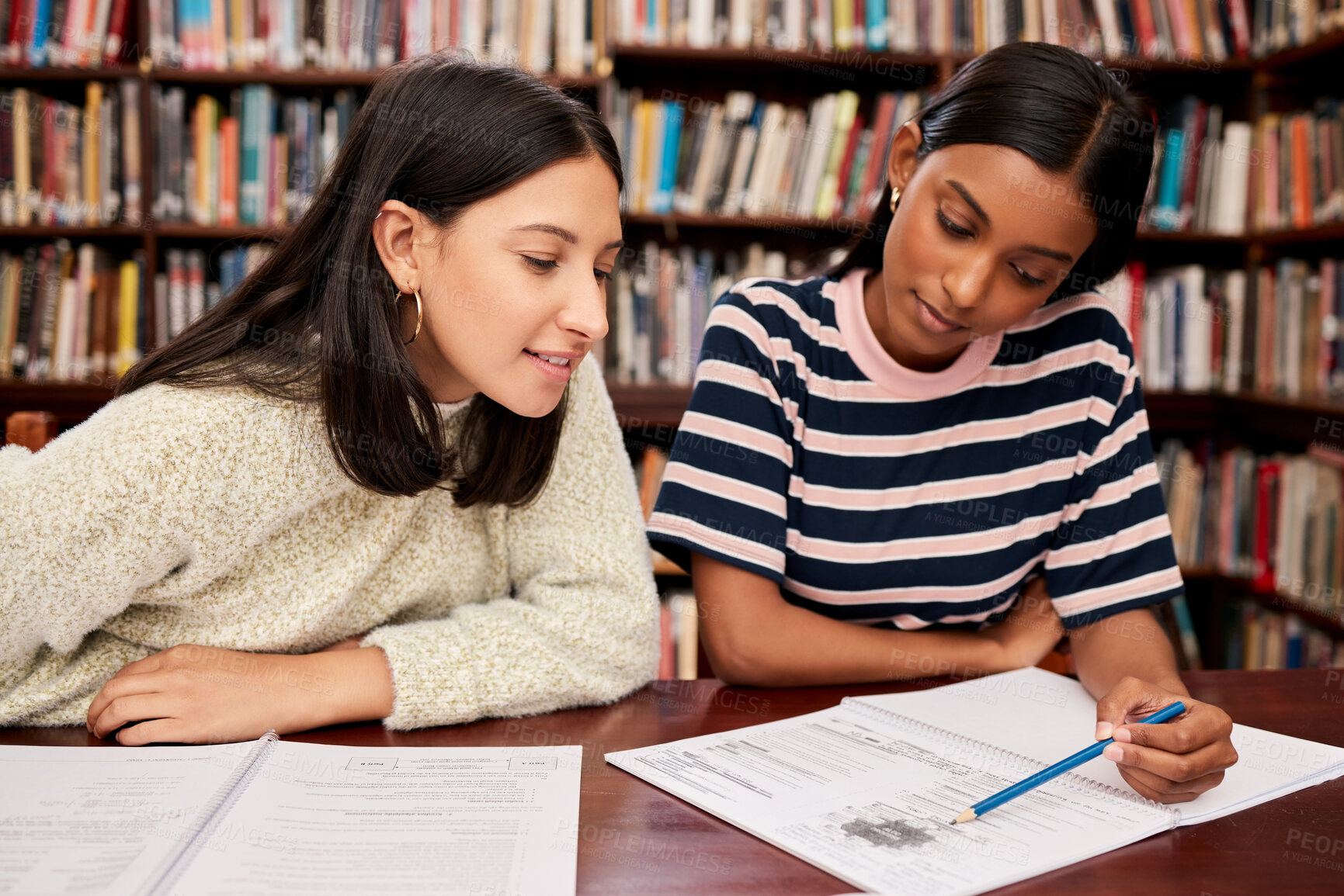 Buy stock photo Education, students and women in library, university with project, tutor and knowledge with research, creative and brainstorming. Girls, college and friends with books, planning and talking with idea