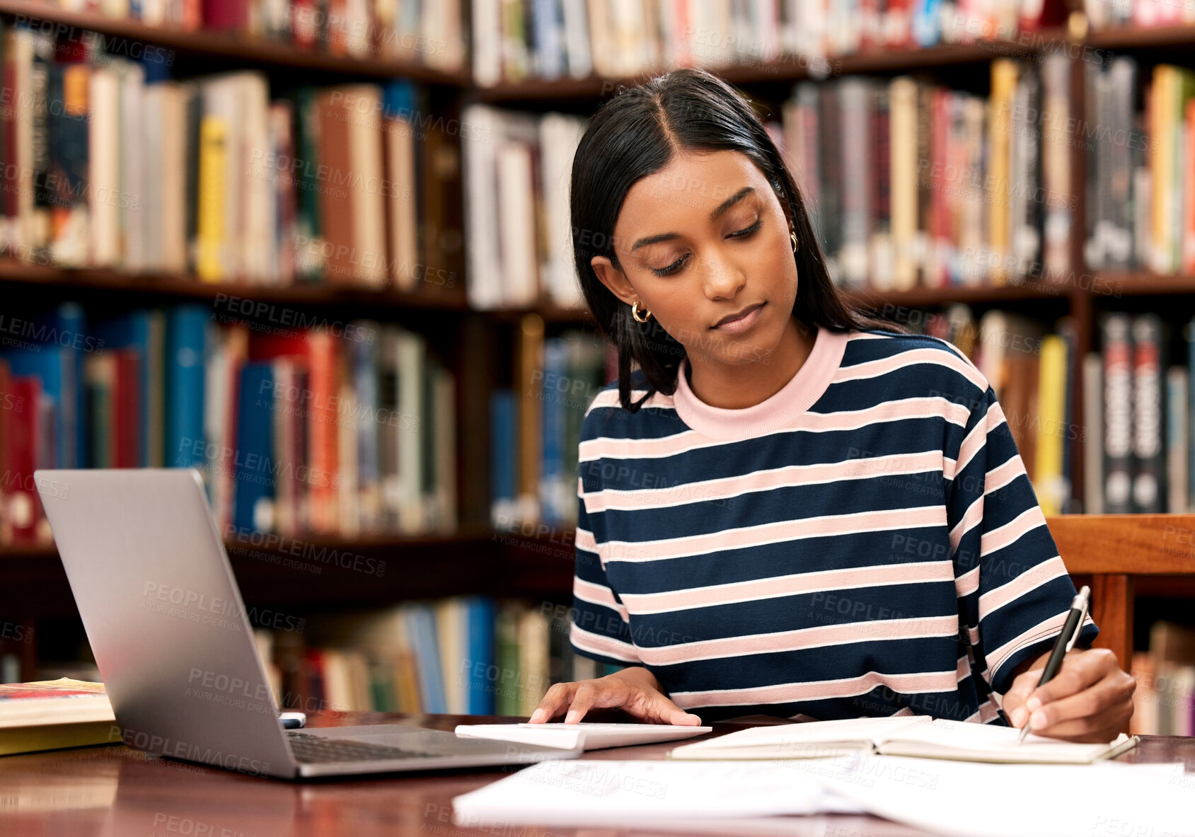 Buy stock photo Student, laptop and girl in library, writing and research for project, university and education. Person, college and woman with computer, books and learning with scholarship, creativity and studying