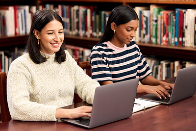 Buy stock photo Women, students and university with laptop, library and education with knowledge, typing and technology. People, college or girls with computer, internet and research for project or academic studying