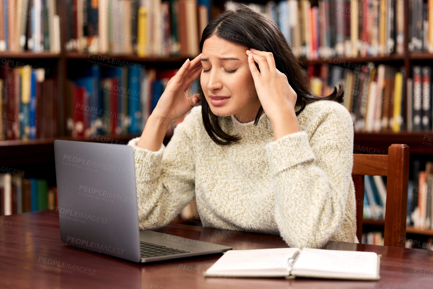 Buy stock photo College, laptop or woman with stress headache at campus library for research, planning or homework burnout. University, depression or student frustrated by exam deadline, anxiety or pc glitch or 404