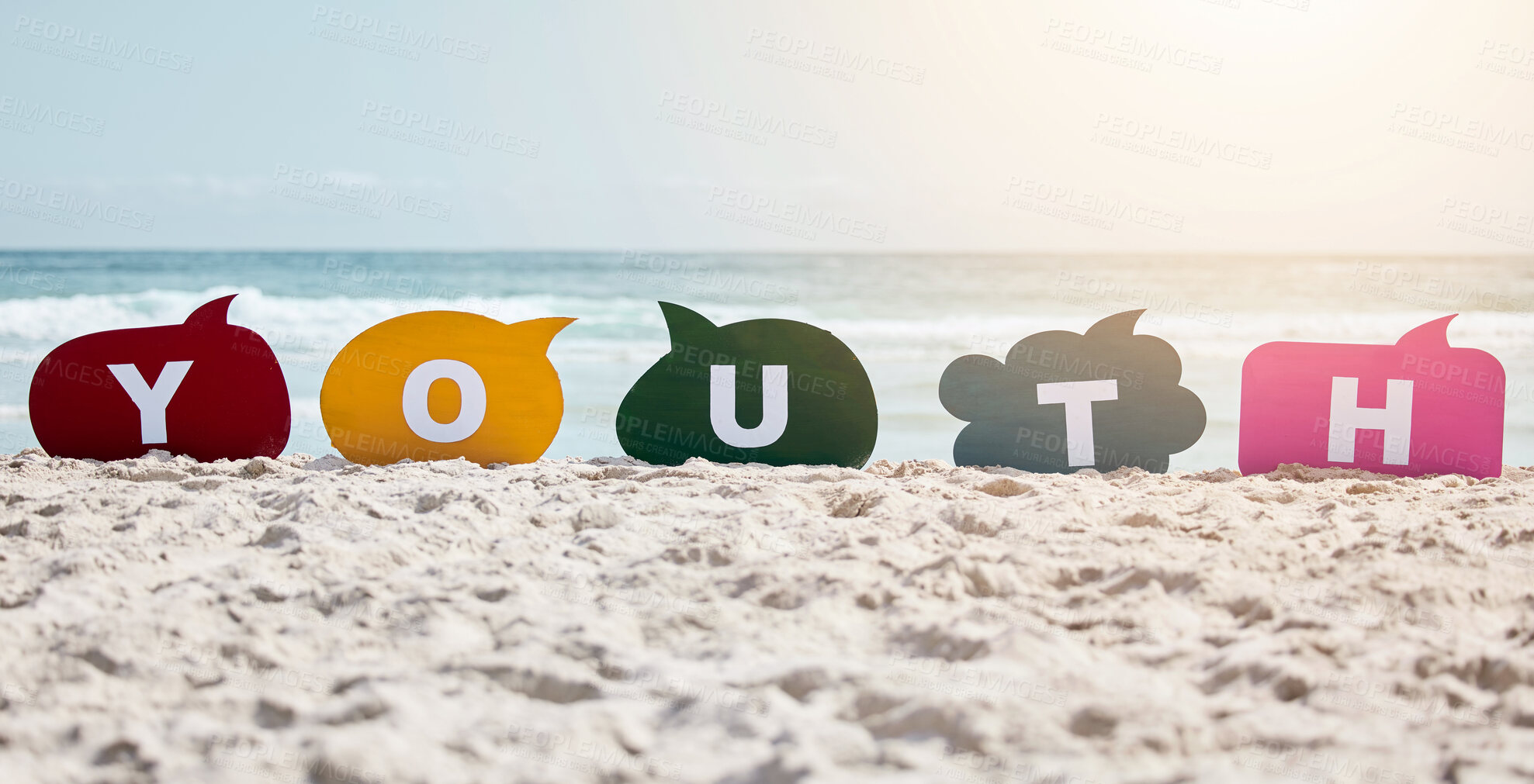 Buy stock photo Speech bubbles, beach and sand with summer, spelling and word on the seashore with communication. Empty, color and letters with voice, lens flare and sunshine with opportunity, seaside and opinion