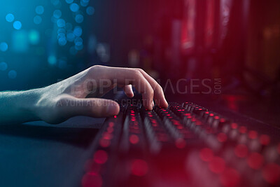 Buy stock photo Shot of an unrecognisable man using a keyboard while playing computer games