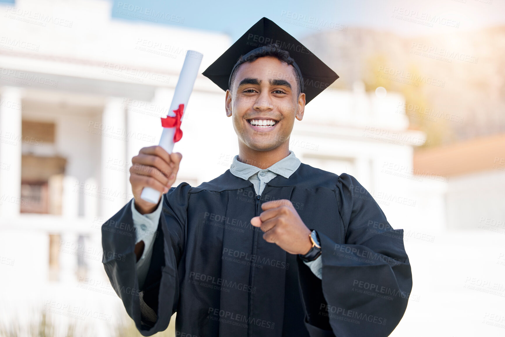 Buy stock photo Portrait of a young man holding his diploma on graduation day