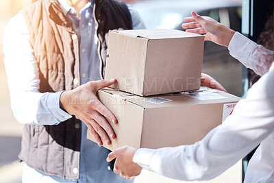 Buy stock photo Closeup shot of an unrecognisable man making a delivery to a customer