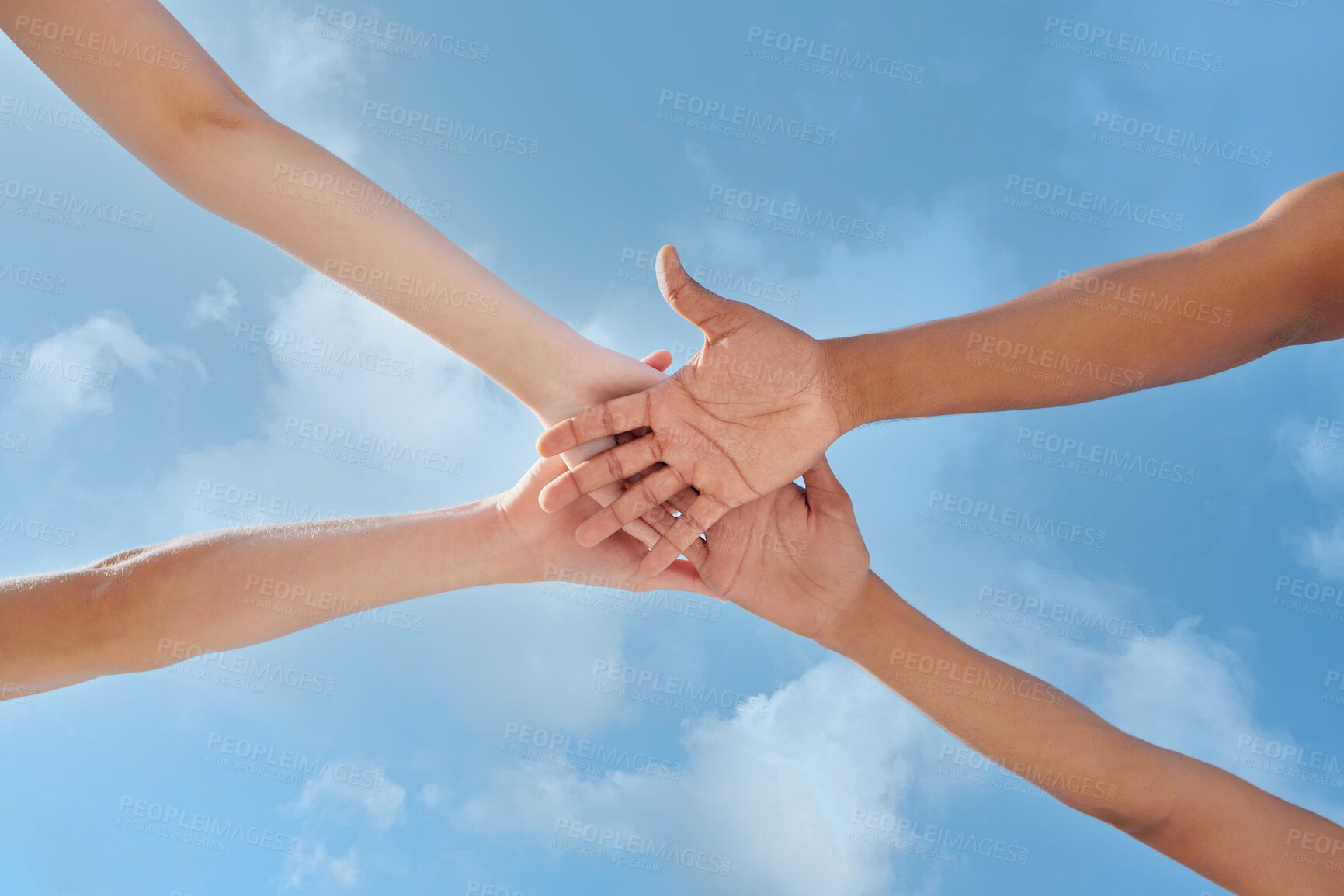 Buy stock photo Shot of a group of unrecognizable people stacking their hands