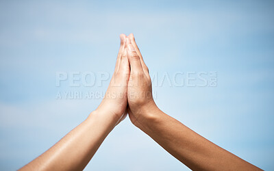 Buy stock photo Low angle shot of two unrecognizable women highfiving outside