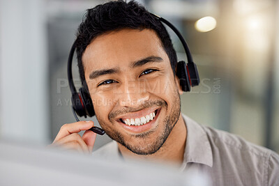 Buy stock photo Young man, call center portrait and smile for telemarketing with headphones, microphone and sales. Indian guy, customer service agent and tech support for contact us, happy and listening in office