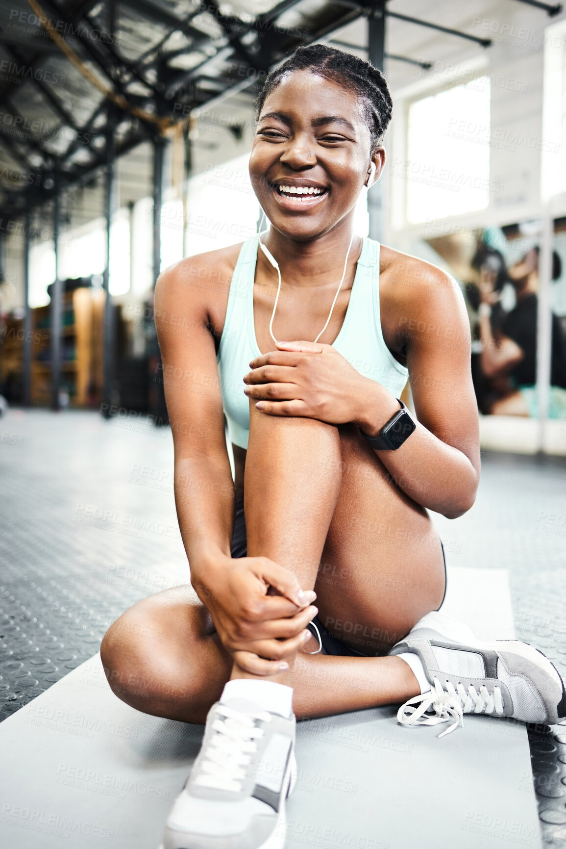 Buy stock photo Fitness, music and laugh with sports black woman in gym for training, wellness or workout. Earphones, exercise and mat with happy athlete in health club for break or rest from physical improvement