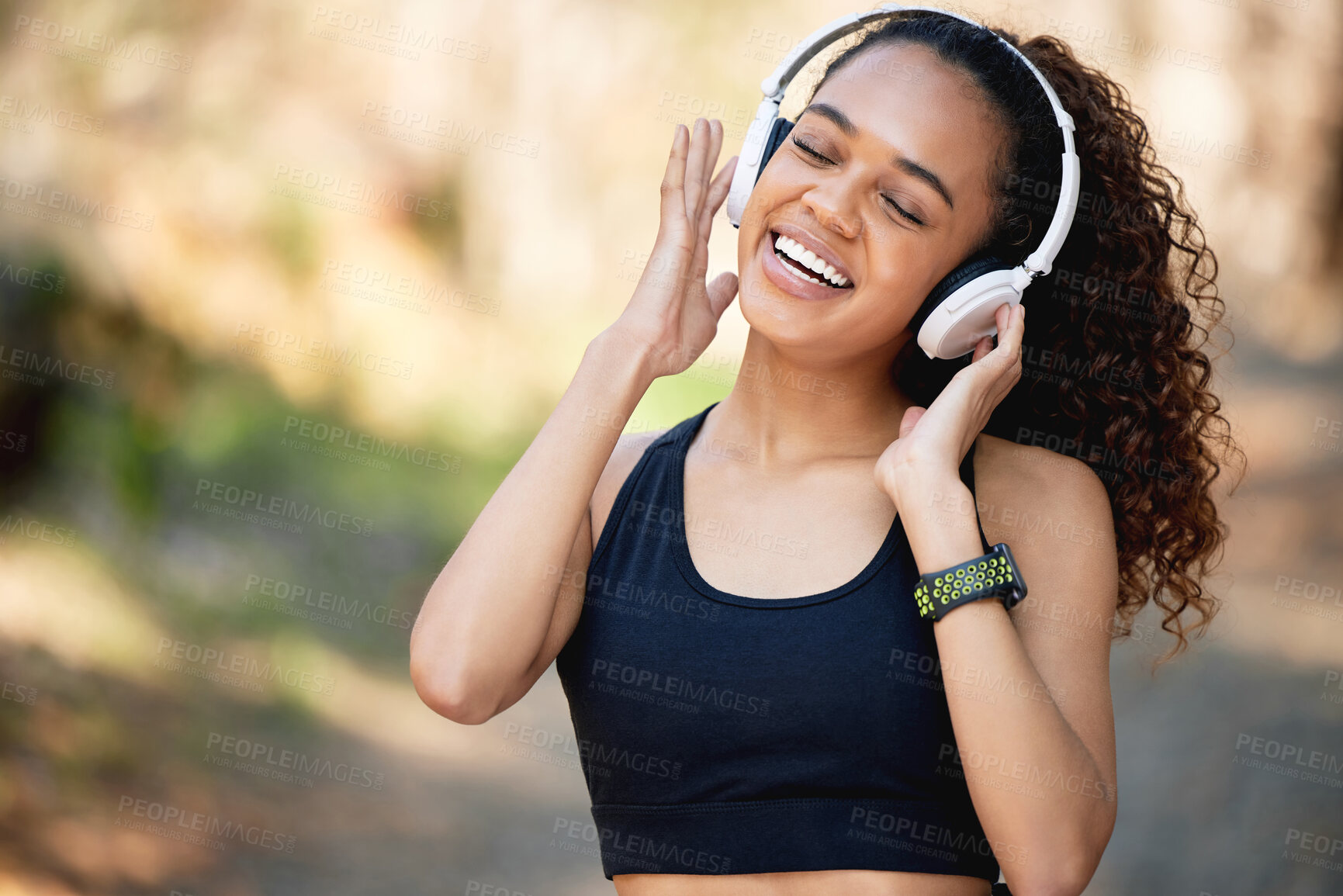 Buy stock photo Woman, headphones and outdoor with exercise in countryside, listening or streaming for workout. Female runner, technology and music with happiness in nature for training, podcast for wellness