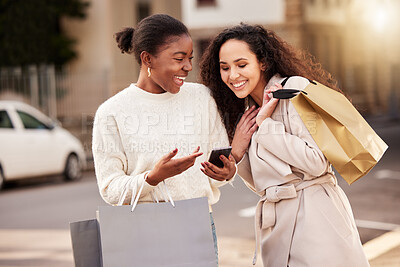 Buy stock photo Smartphone, women and friends with shopping bag for sale, discount or retail together outdoor by mall. People, product or cellphone for ecommerce, online store and deal for fashion or luxury clothes