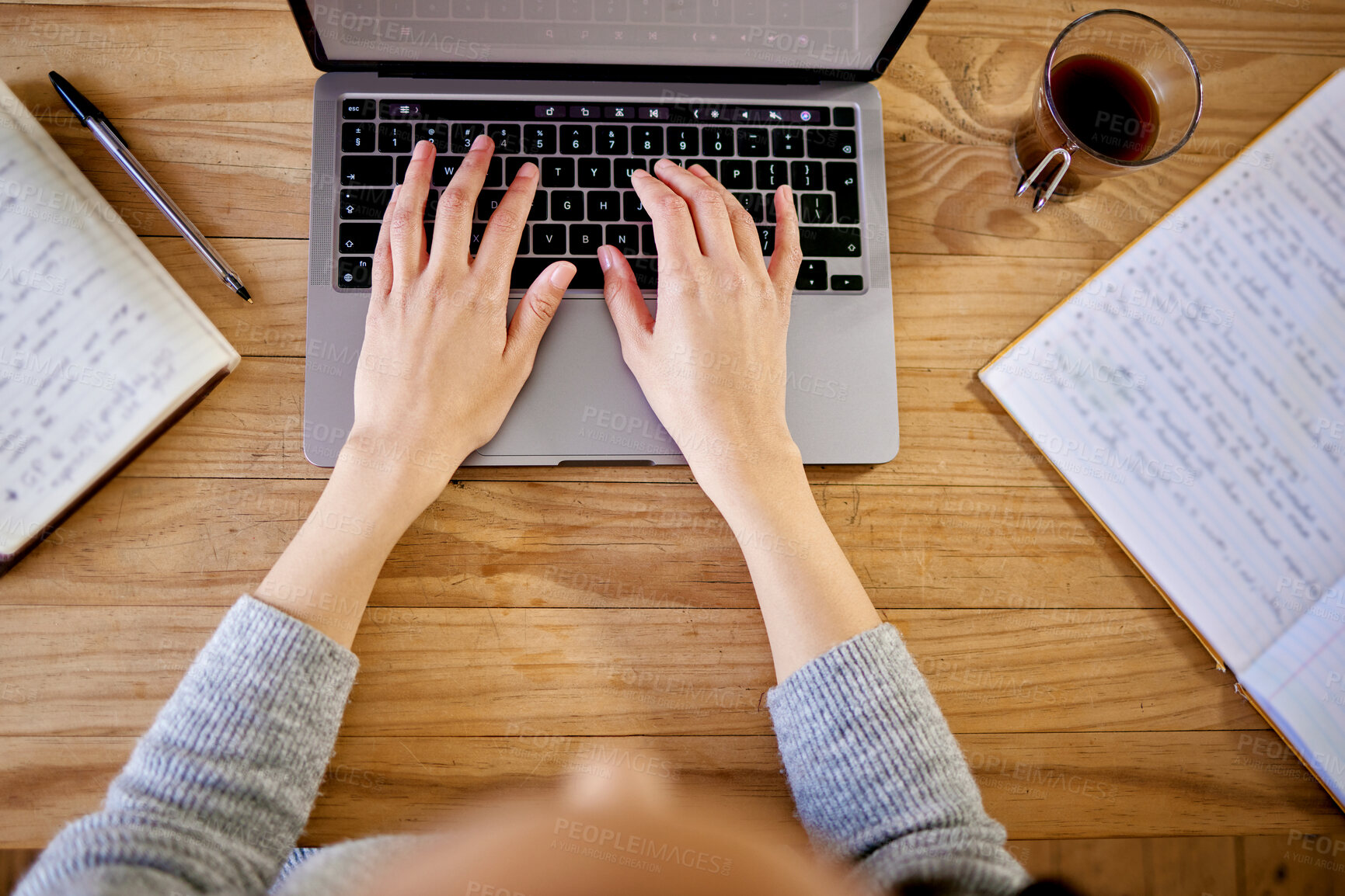 Buy stock photo Shot of a unrecognizable female working from home