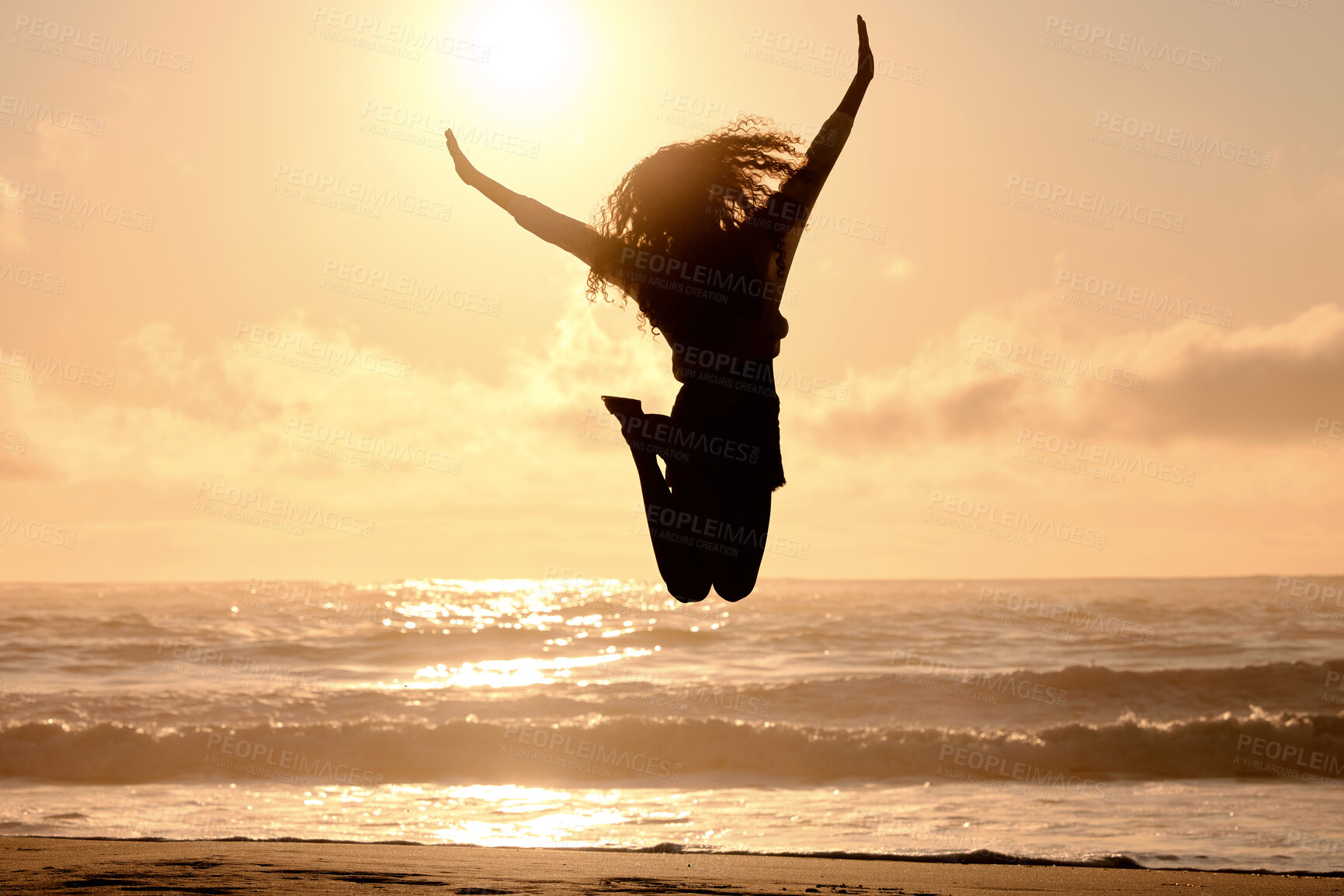 Buy stock photo Freedom, jump and sunset with woman at beach for travel, celebration and winner. Success, summer and silhouette with person jumping in nature for inspiration, energy and purpose with mockup space