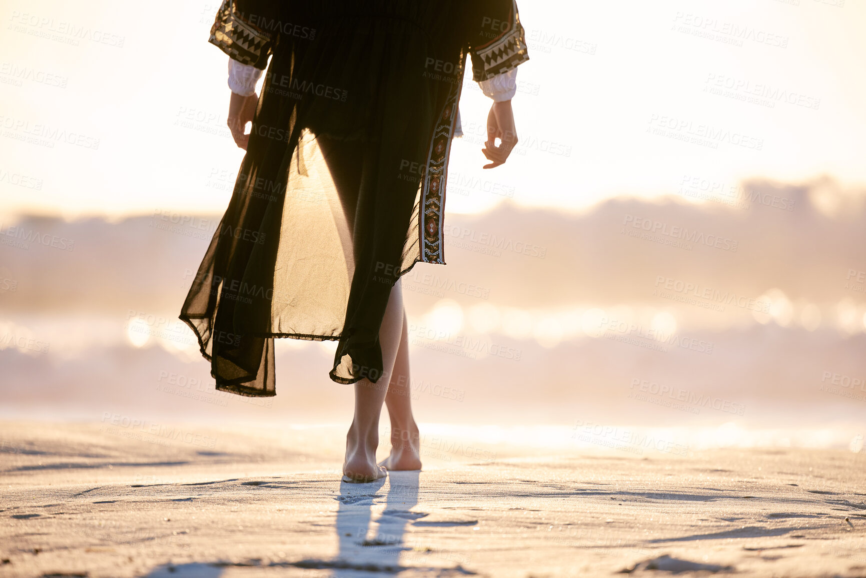 Buy stock photo Beach, sunset and legs of person walking on holiday, vacation and tropical summer travel outdoor in Hawaii. Back, ocean and feet at sea on sand in nature for adventure, journey and relax by water