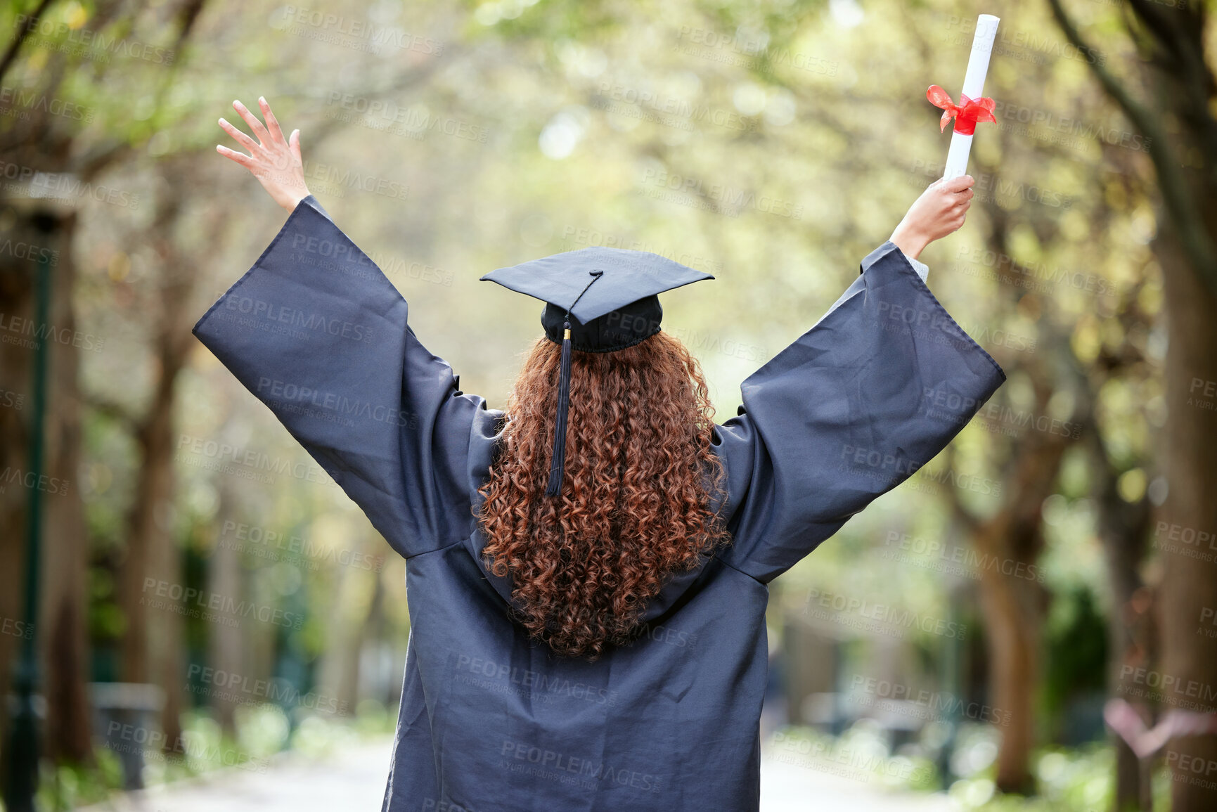 Buy stock photo Celebration, back view of university student and with certificate outdoors. Success or achievement, graduate or happiness and winner woman at college campus outside on graduation day for diploma