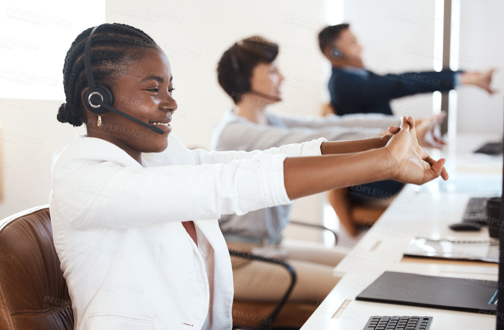 Buy stock photo Woman, stretching and happy at desk in call center for customer service, headset and telemarketing with sales. Female agent, headphones and stretch arms for consultation, crm support and contact us