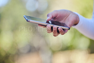 Buy stock photo Smartphone, hand and social media in nature for social media, chat and internet post outdoors. Mobile app, phone search and closeup of person for typing, online blog or notification from text in park