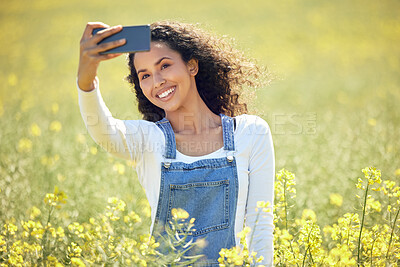 Buy stock photo Farmer, selfie and smile with field, nature or flowers with profile picture for sustainable farming. Farmer, agriculture or ecology for meadow, environment or ecology for carbon capture or green love