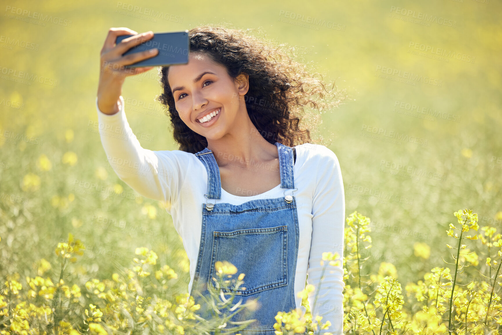 Buy stock photo Farmer, selfie and smile with field, nature or flowers with profile picture for sustainable farming. Farmer, agriculture or ecology for meadow, environment or ecology for carbon capture or green love