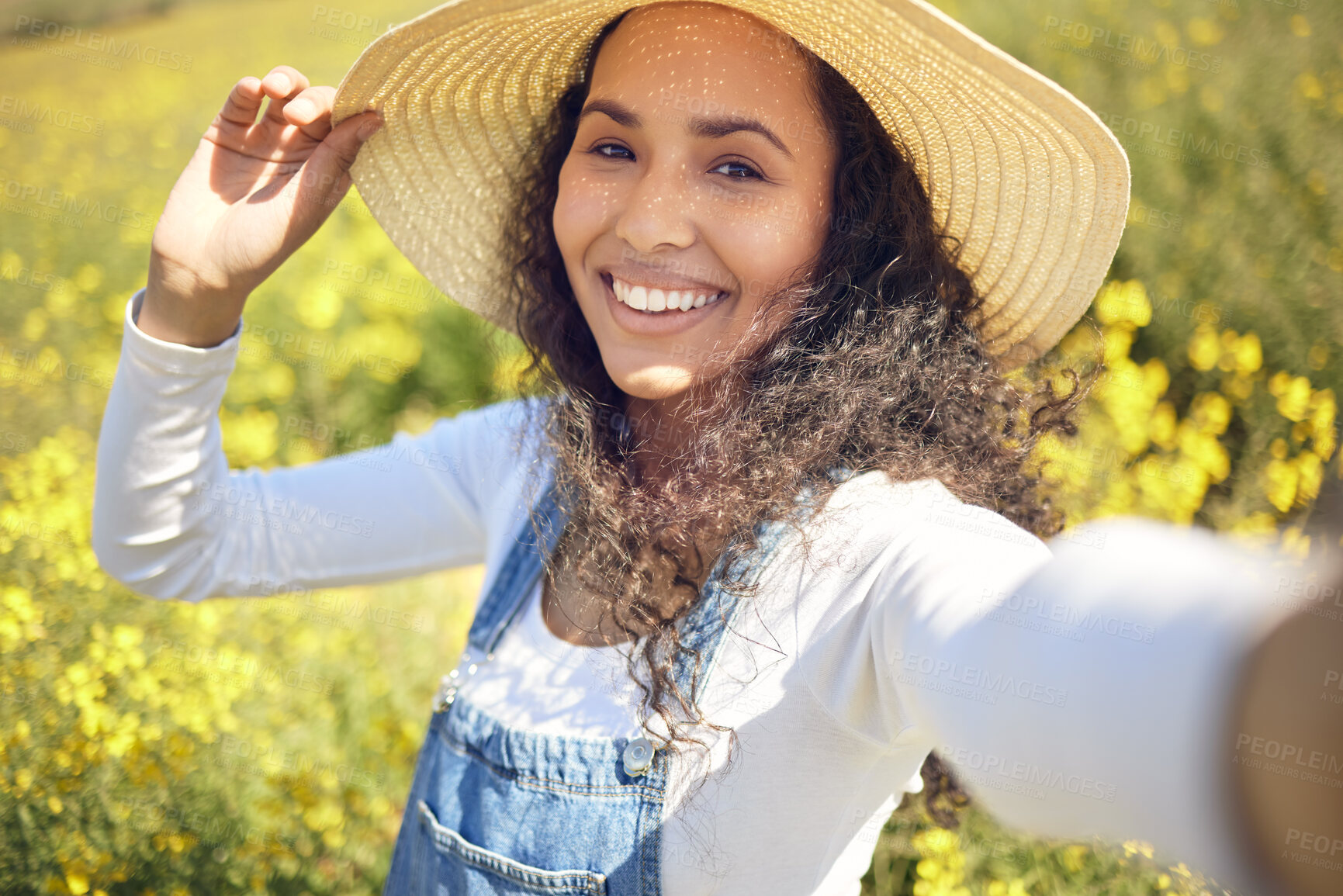 Buy stock photo Woman, selfie and smile for flowers, nature or field with sun hat portrait or sustainable farming. Farmer, agriculture and ecology with meadow, environment or countryside for carbon capture or green