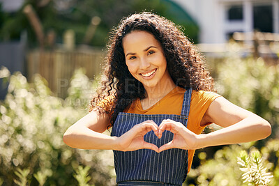 Buy stock photo Happy woman, portrait and small business with heart hands for garden review, vote or love in nature. Young female person or entrepreneur with apron, smile or emoji for eco friendly environment