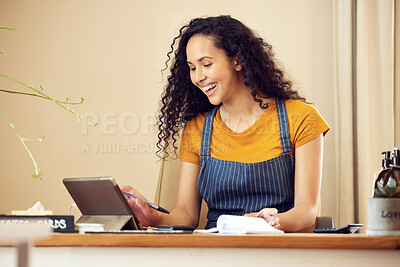 Buy stock photo Happy, young woman or cashier with tablet in shop counter for retail shopping, pos operator and business transaction. Female person, technology and receipts in store for accounting and planning