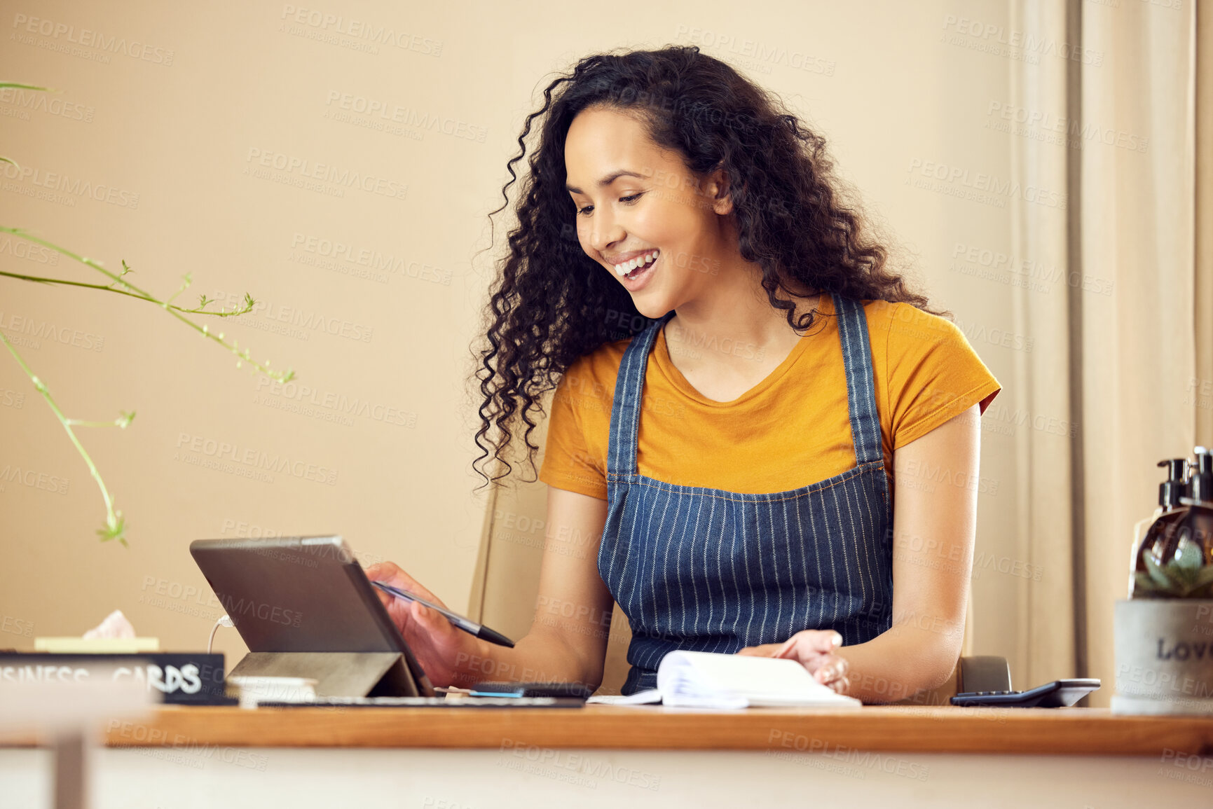 Buy stock photo Happy, young woman or cashier with tablet in shop counter for retail shopping, pos operator and business transaction. Female person, technology and receipts in store for accounting and planning