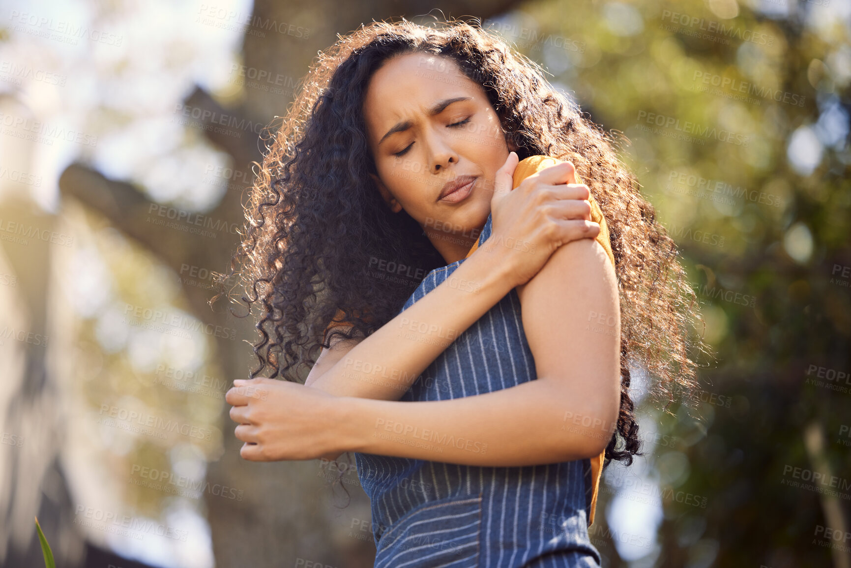 Buy stock photo Shoulder, pain and woman in garden with injury, accident or florist sick of stress outdoor in low angle. Arm, worker and muscle problem of fatigue, arthritis or tired of fibromyalgia in greenhouse