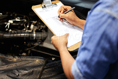 Buy stock photo Hands, car mechanic and writing on checklist for service, maintenance and document repair list. Hand, man and engineer with vehicle inspection survey, report and checking engine motor in garage