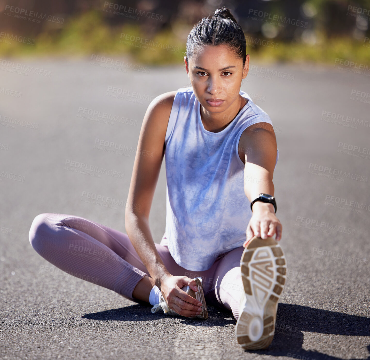 Buy stock photo Full length portrait of an attractive young female athlete warming up for an outdoor run