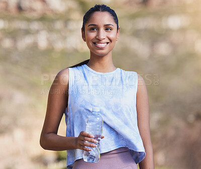 Buy stock photo Fitness, water and woman running in nature for race training by an outdoor mountain for health. Sports, exercise and female athlete with a bottle of liquid for hydration during a cardio workout.