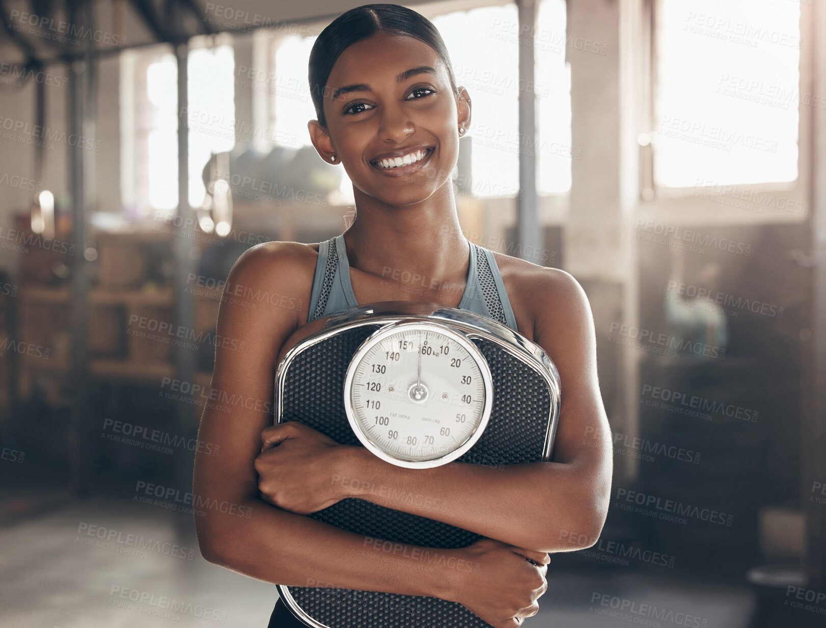 Buy stock photo Scale, fitness and portrait of woman in gym for health, wellness and weightloss workout. Smile, training and female athlete with confidence and pride for muscle exercise in sports center in India.