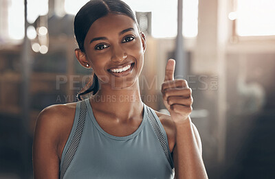 Buy stock photo Woman in gym, thumbs up in portrait and fitness with like emoji, smile and health goals with sport and mockup space. Hand gesture, yes and motivation with Indian female athlete at exercise studio