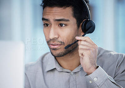Buy stock photo Listening, call center and business man on computer for telemarketing, customer service and support in office. Crm, contact us and Asian male sales agent, consultant and professional with microphone.