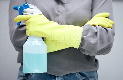 Buy stock photo Person, spray and bottle in studio for cleaning dust, disinfecting and sanitation for health and hygiene. Woman or housekeeper, liquid detergent and isolated on grey background with arms crossed