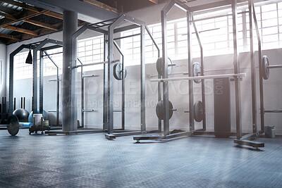 Buy stock photo Shot of weight training equipment in a gym