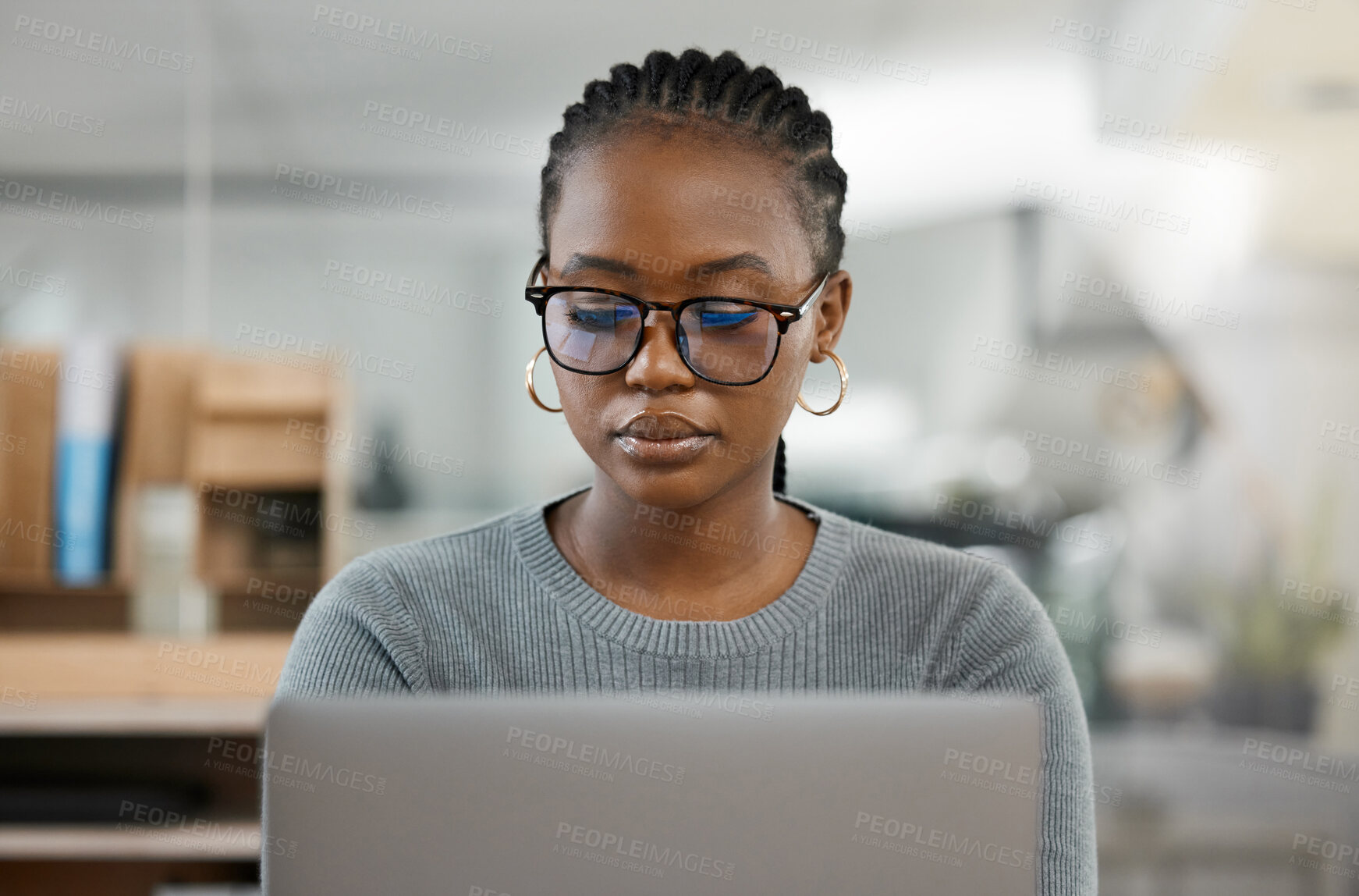 Buy stock photo Laptop, business and black woman in office online for research, copywriting and typing email. Journalism, professional and female worker on computer writing proposal, working on report and project