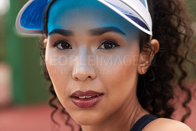 Buy stock photo Closeup shot of a female tennis player standing outside